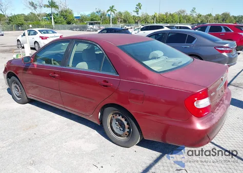 2002 Toyota Camry Le from USA, damaged, VIN JTDBE32K120006371